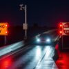 Wrong-way driving detection system warning a driver at a highway ramp
