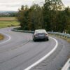 Rural roadway departure crash prevention with curve warning signs and guardrails