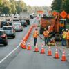 Work zone speed safety cameras in 2026 monitoring traffic near construction workers